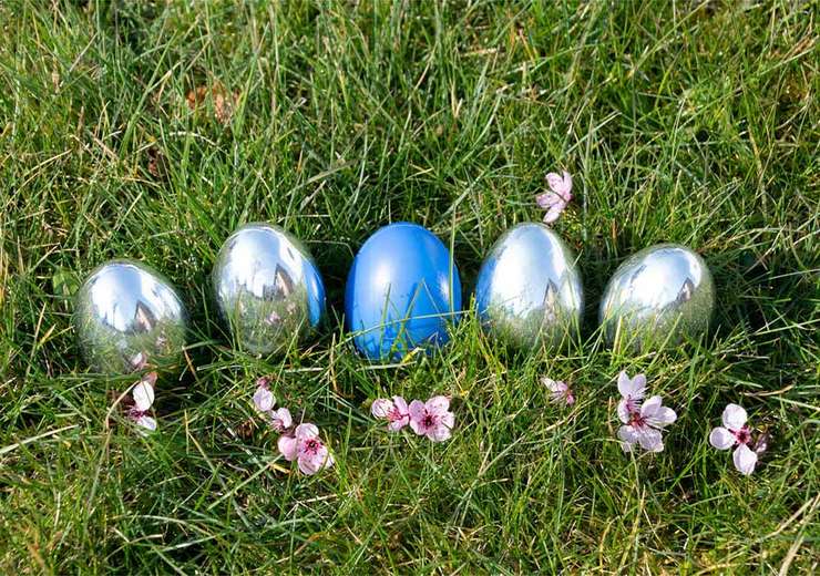 Easter eggs lie on the grass